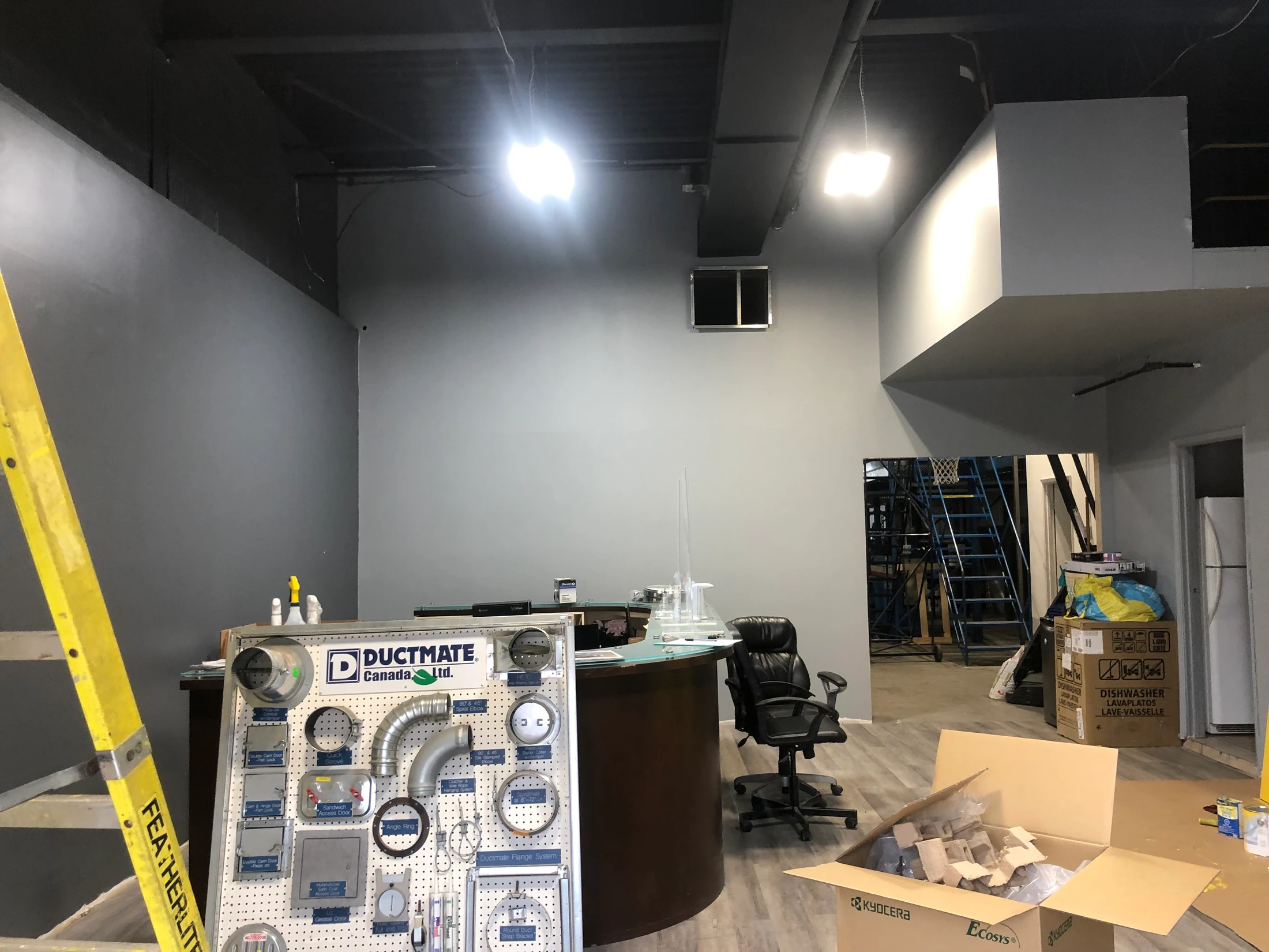 Avenue Air Depot storefront being prepared with a service counter and HVAC product display